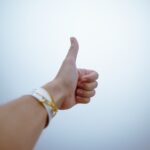 Person Doing Thumbs Up - POSITIVE