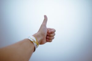 Person Doing Thumbs Up - POSITIVE