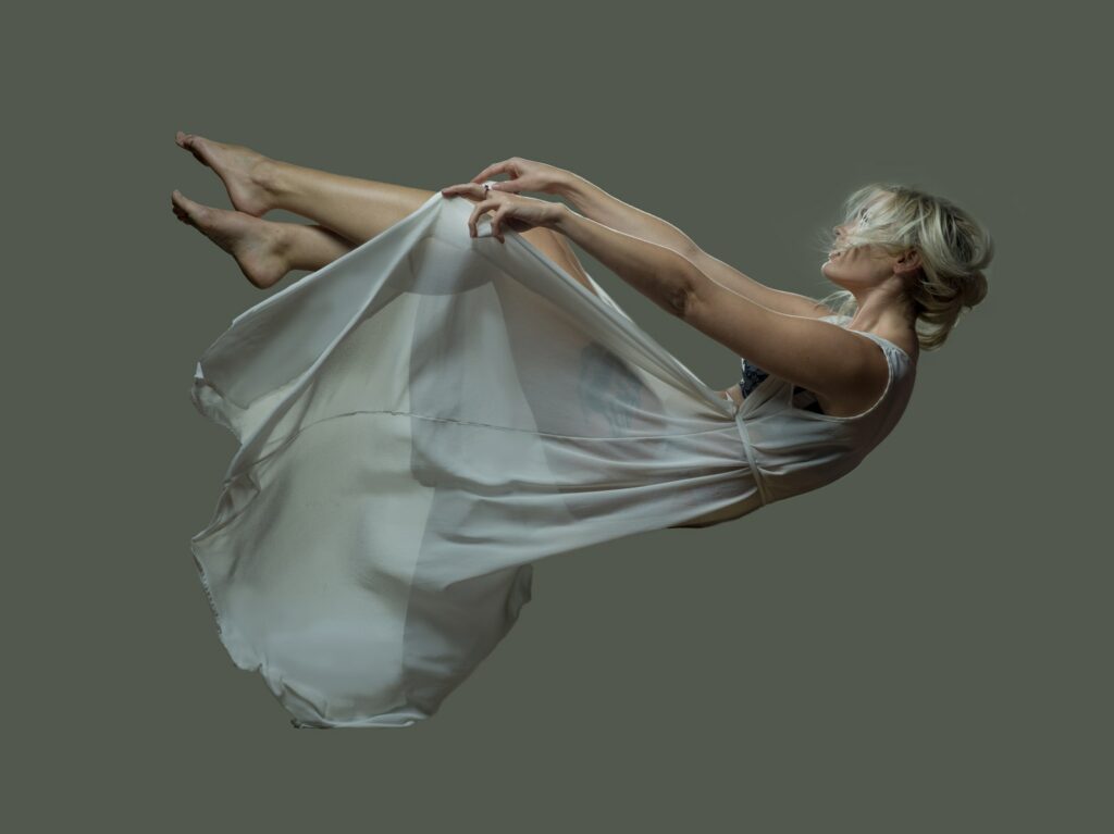 A Falling Woman Wearing a Sheer Dress dream