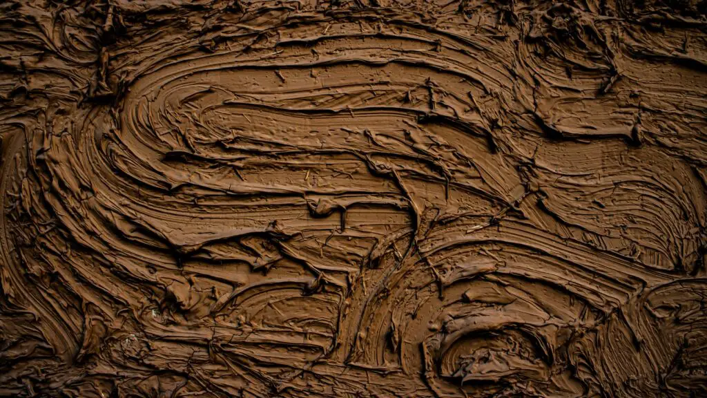 brown and black abstract painting mud dream