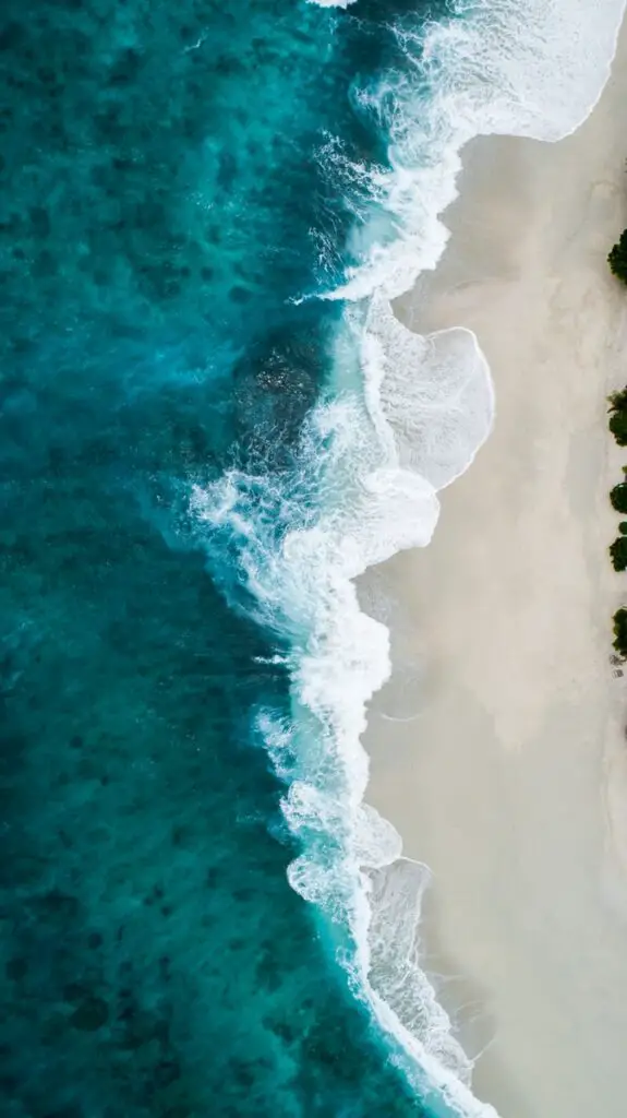 aerial photography of large body of water and shoreline sea dream