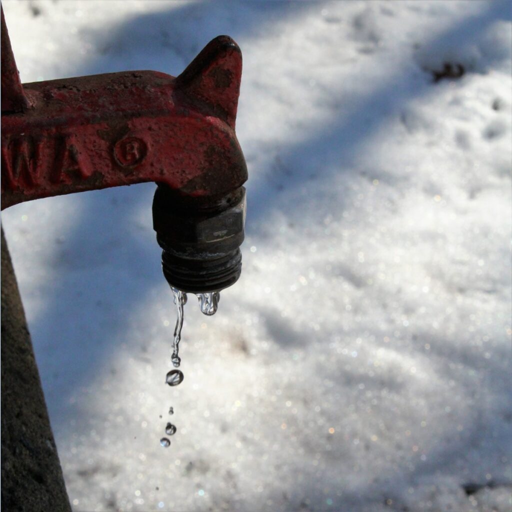 red metal tool on snow covered ground ;leak dream