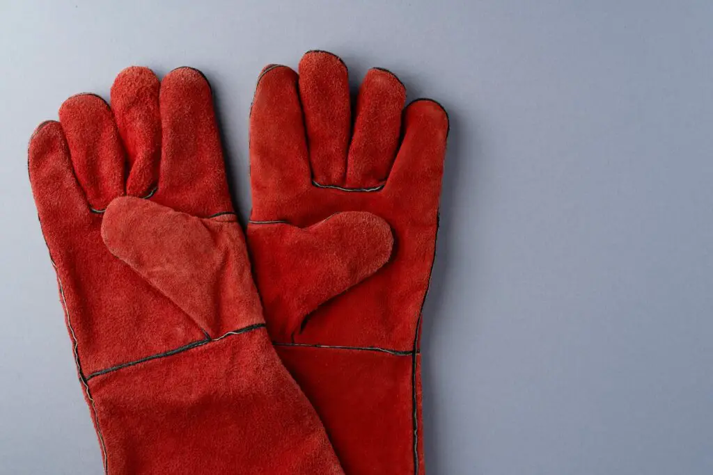 red textile on white gloves dream