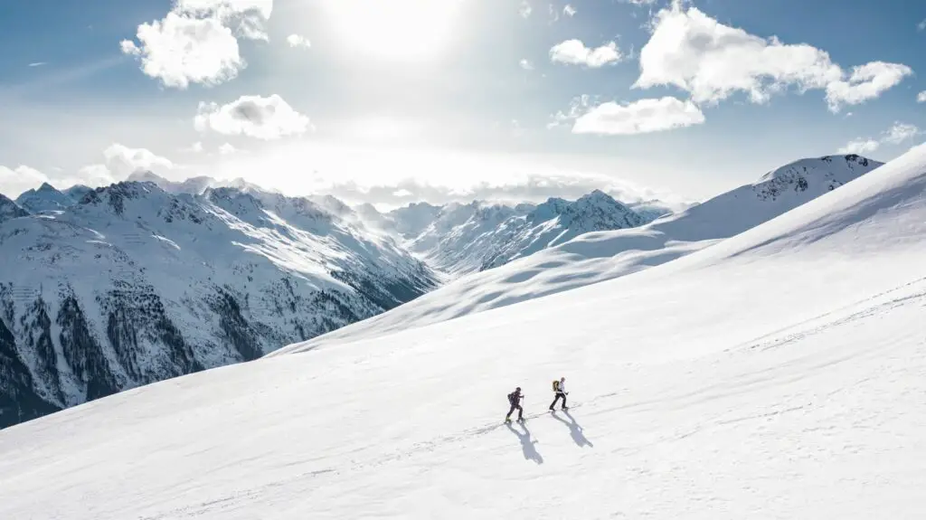 Two Man Hiking on Snow Mountain dream